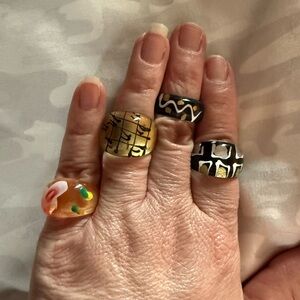 Elegant Gold and Black Patterned Rings Set